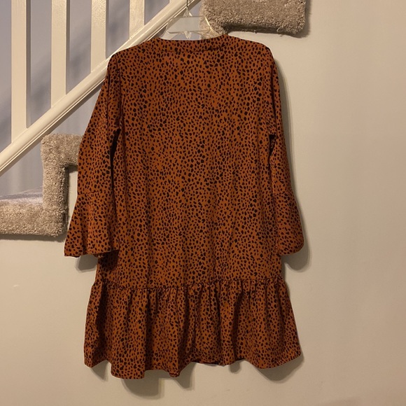 Boutique:Cheetah print brown with black spots, Bell sleeve dress never worn - Picture 2 of 11